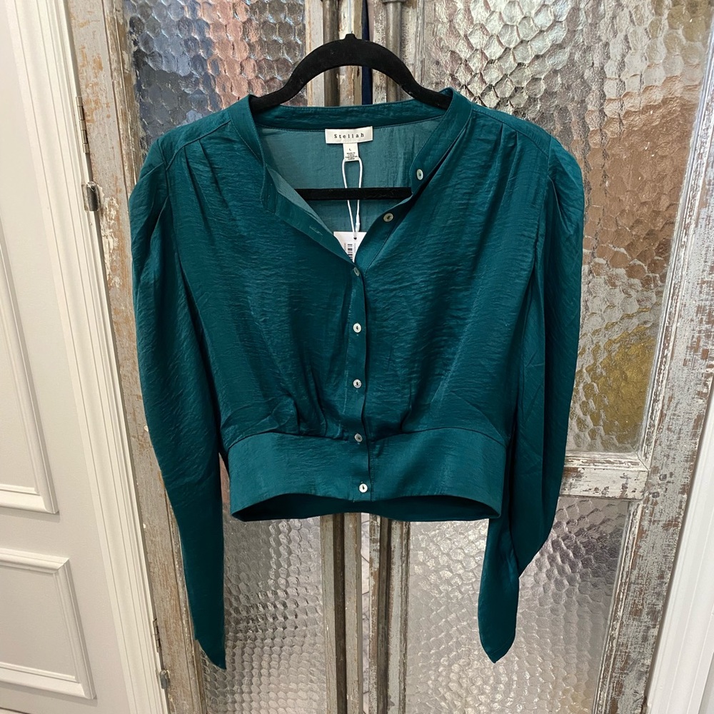 Green silky blouse, very good condition, new with tags, never worn